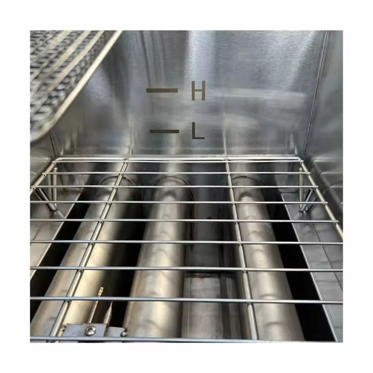 Interior heating rack of the standing deep fryer with oil-level markings
