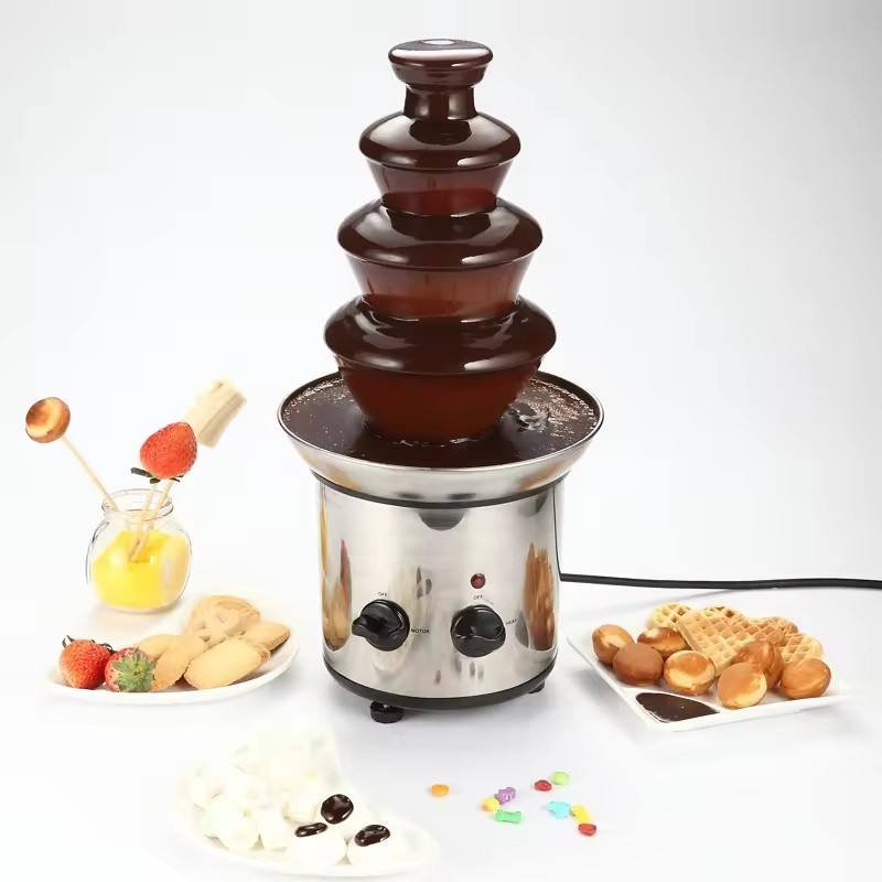3 tier chocolate fountain with fruit and dessert skewers for dipping