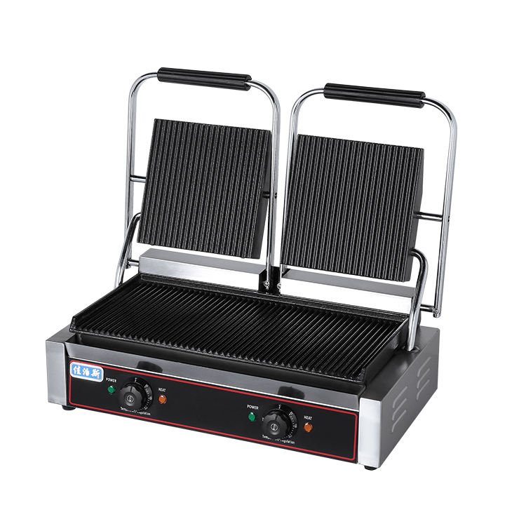 Double plate electric contact grill with both lids open, showing ribbed grill plates