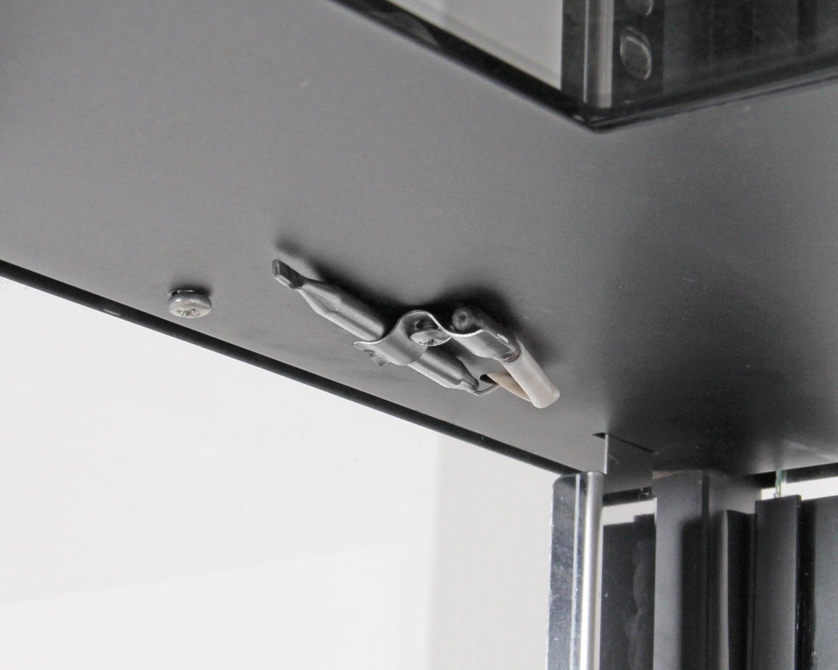 Close-up of a stainless steel food pan inside the warmer